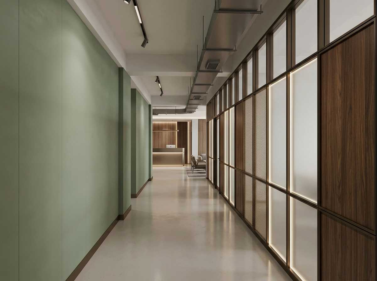 jasa partisi gypsum bali sedang melakukan tahap finishing dinding penyekat interior kantor di Bali.